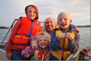 Jed and the kids enjoying a fishing trip